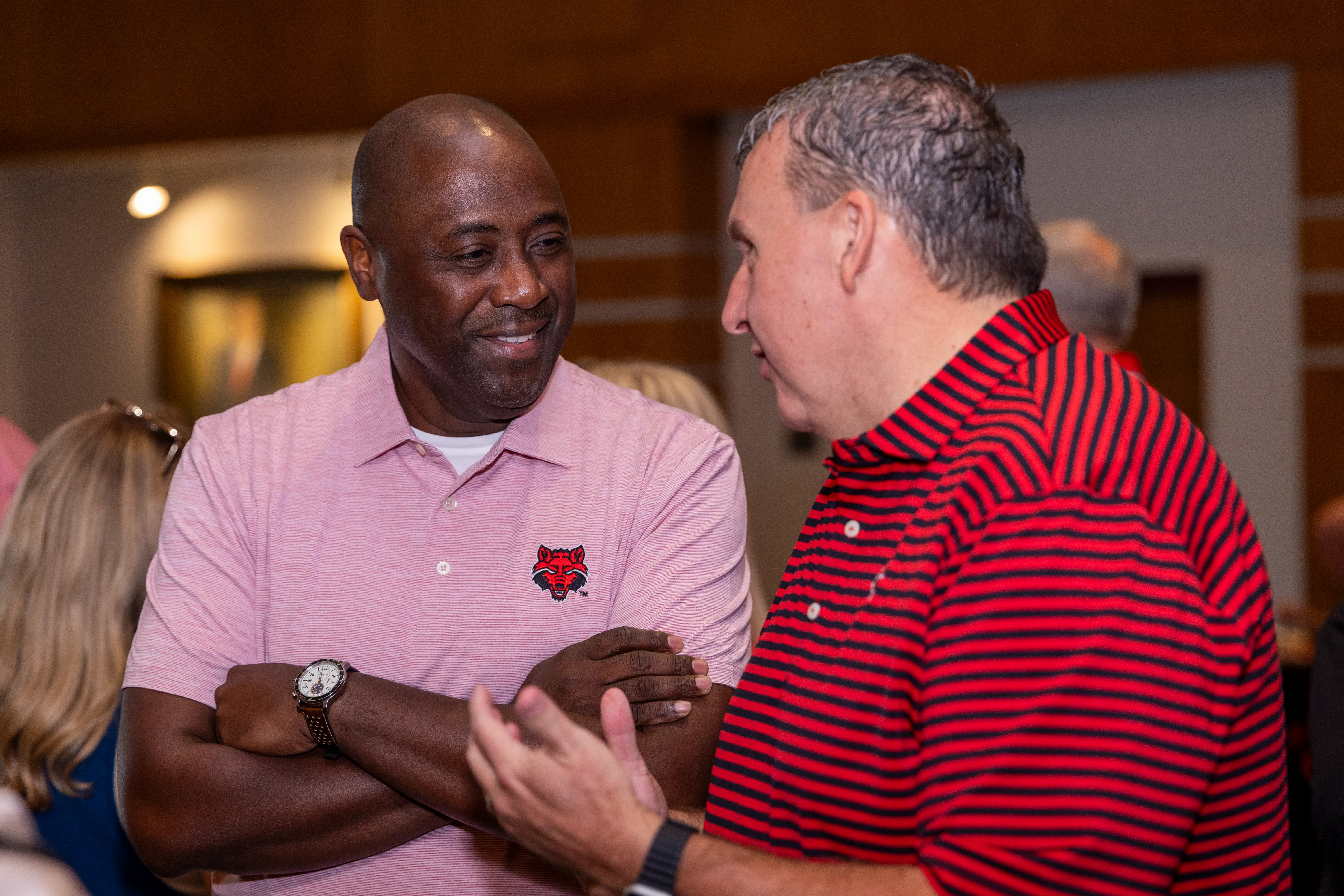 Dr. Calvin White visits with ASU System Board of Trustee Member Paul Rowton