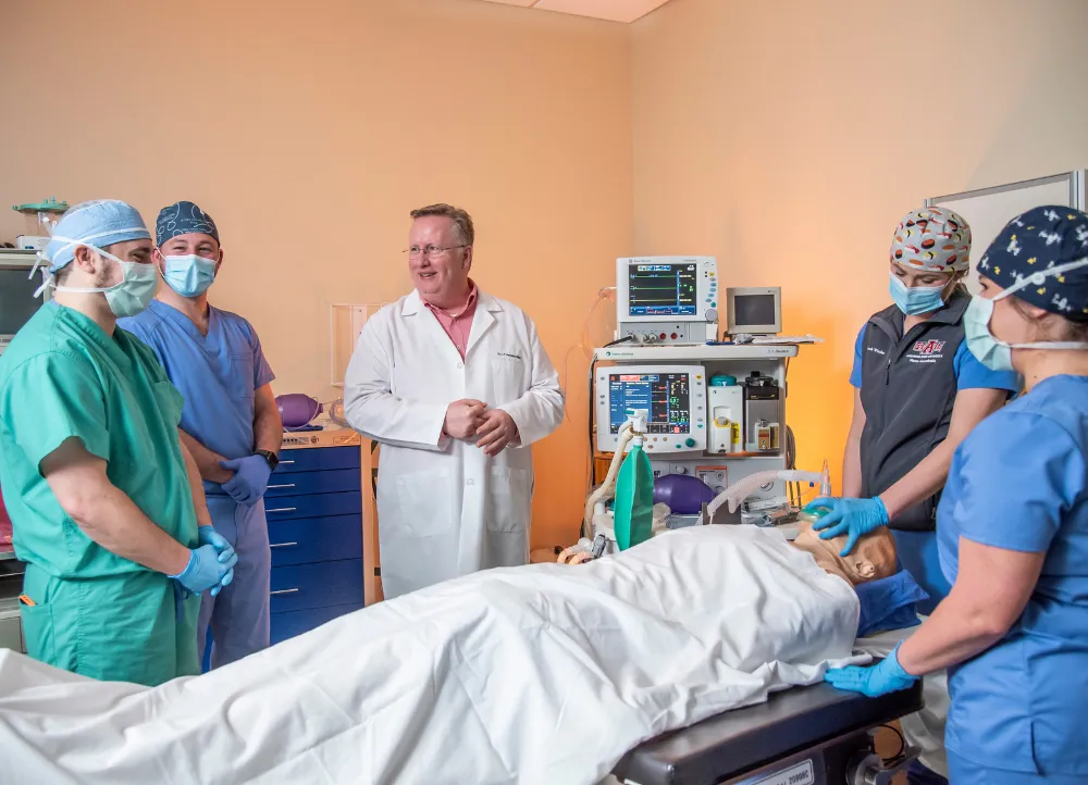 Nurse Anesthesia students practicing in class