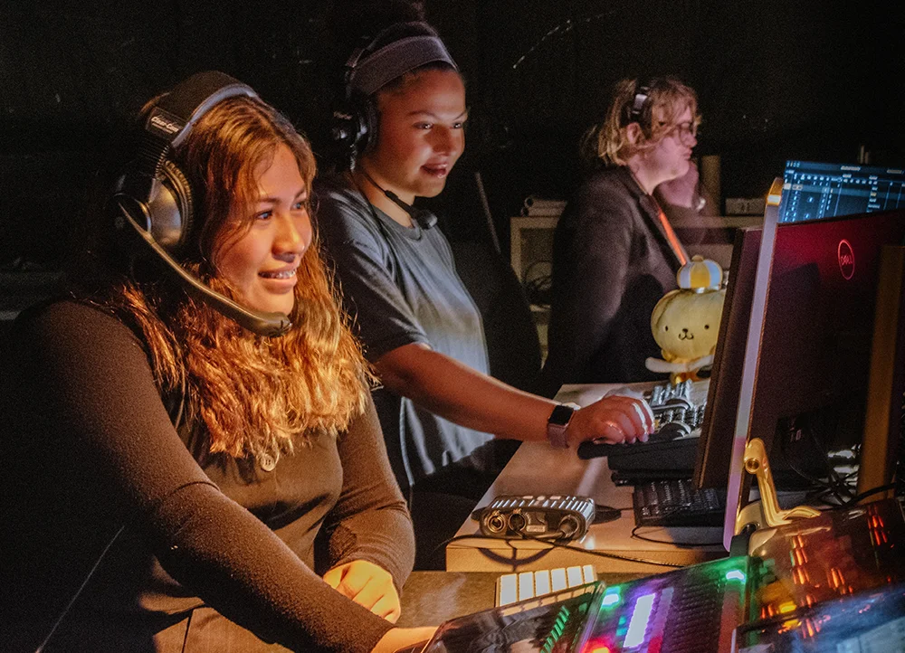 Students operating cameras and sound.