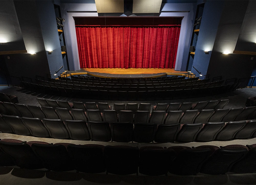 The Drama Theatre stage with the curtain down.