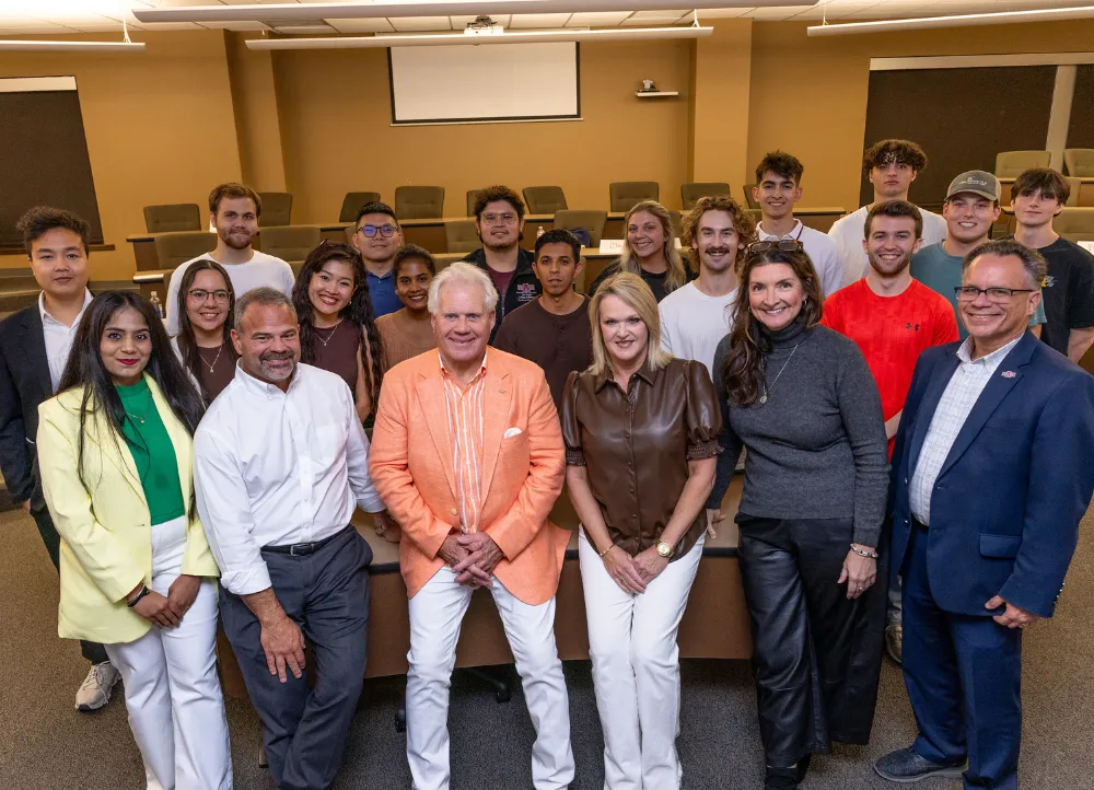 Speaker Johnny Allison with Dr. Shields' Chancellor's Leadership Team in the Delta Economic Center.