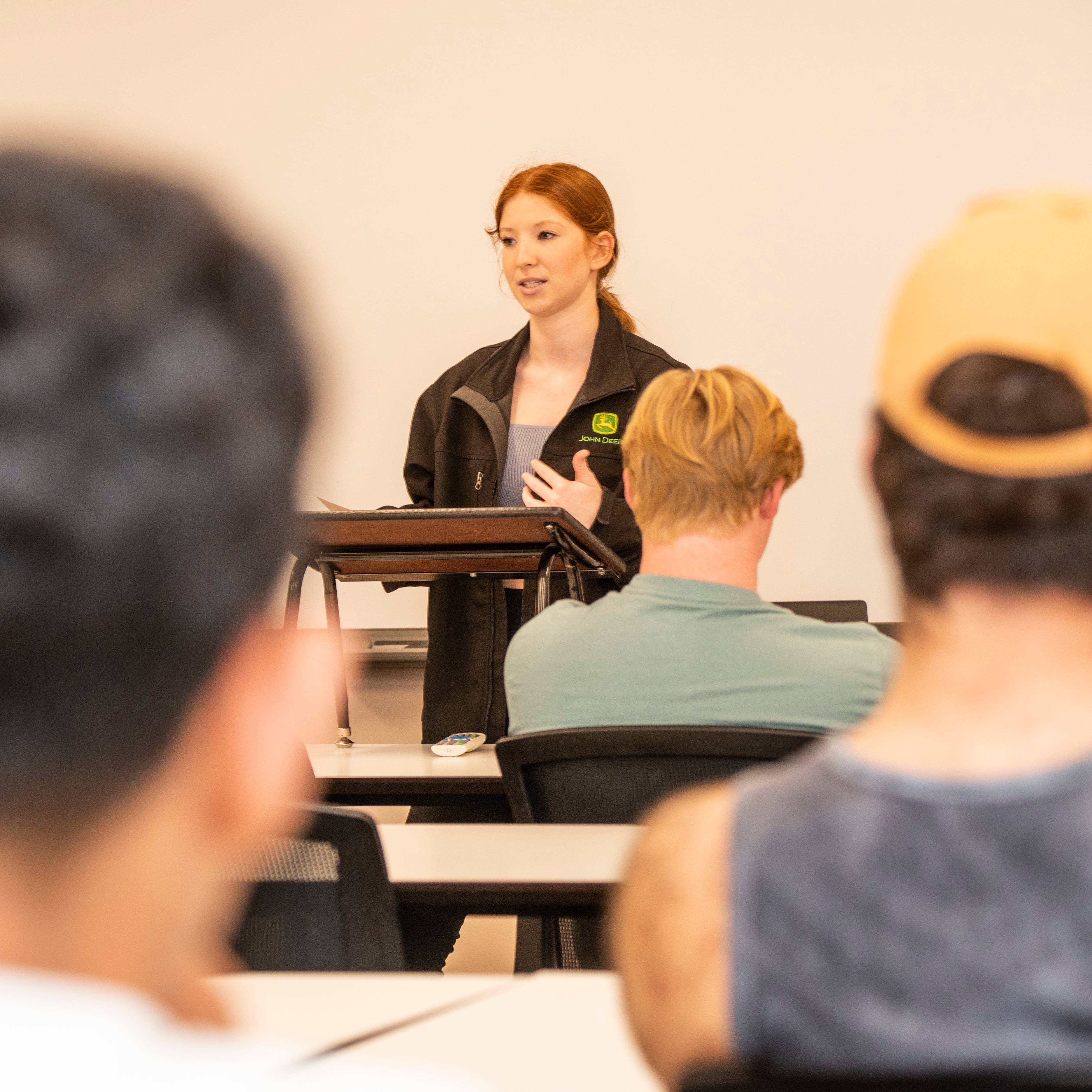 A student giving a presentation.