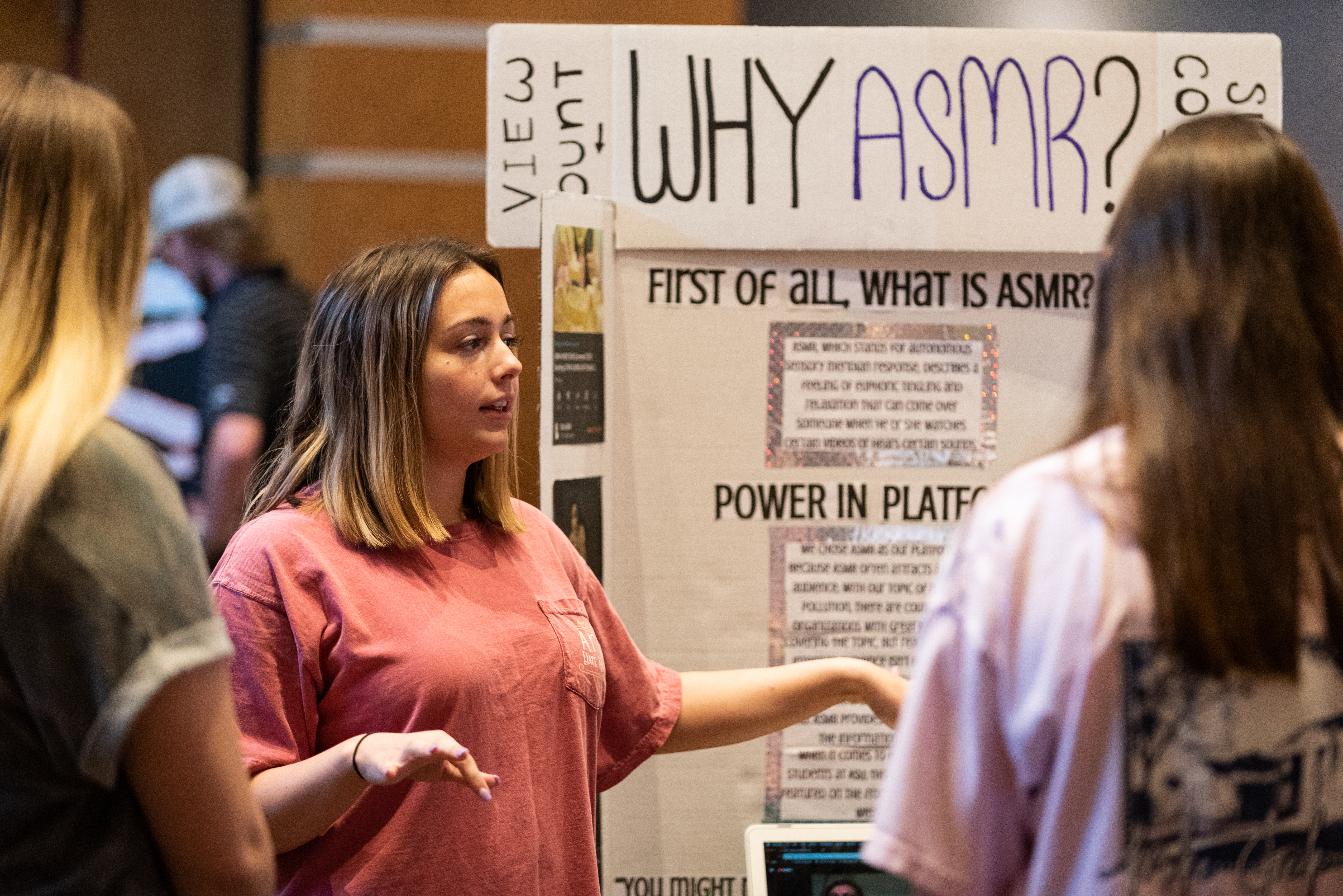 A student giving a presentation on ASMR.