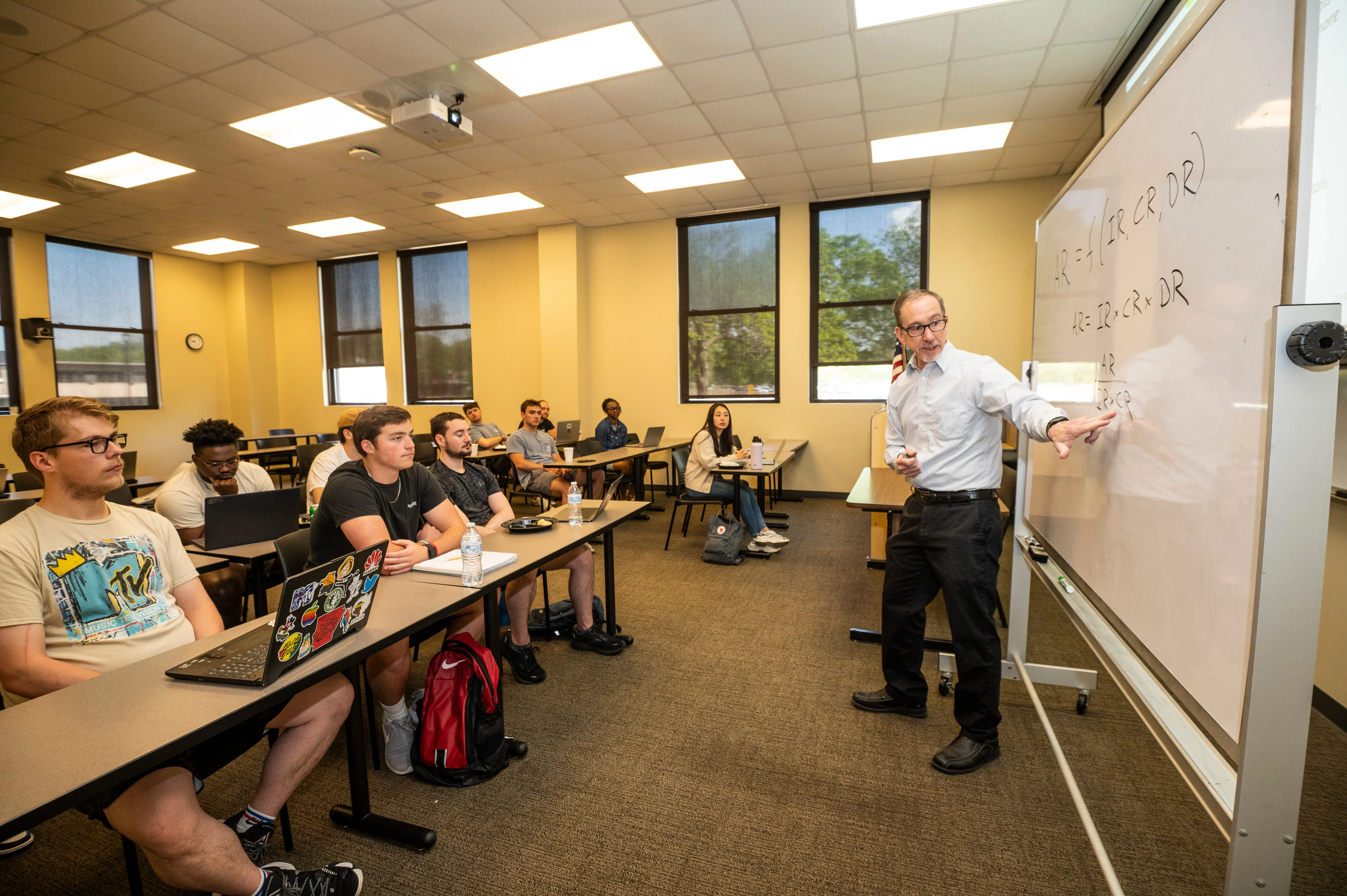 A-State students in business lecture from guest speaker