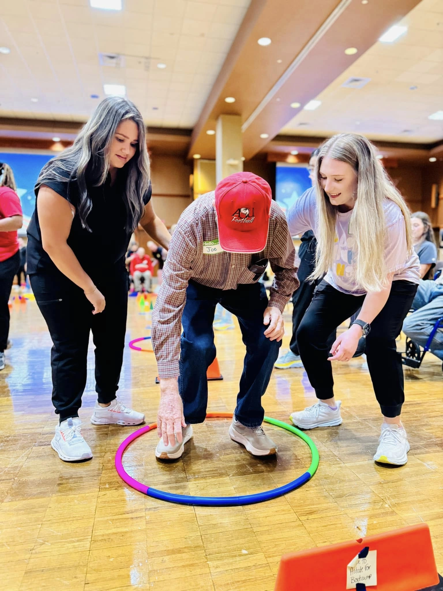 Occupational Therapy student working with patient in a clinic.