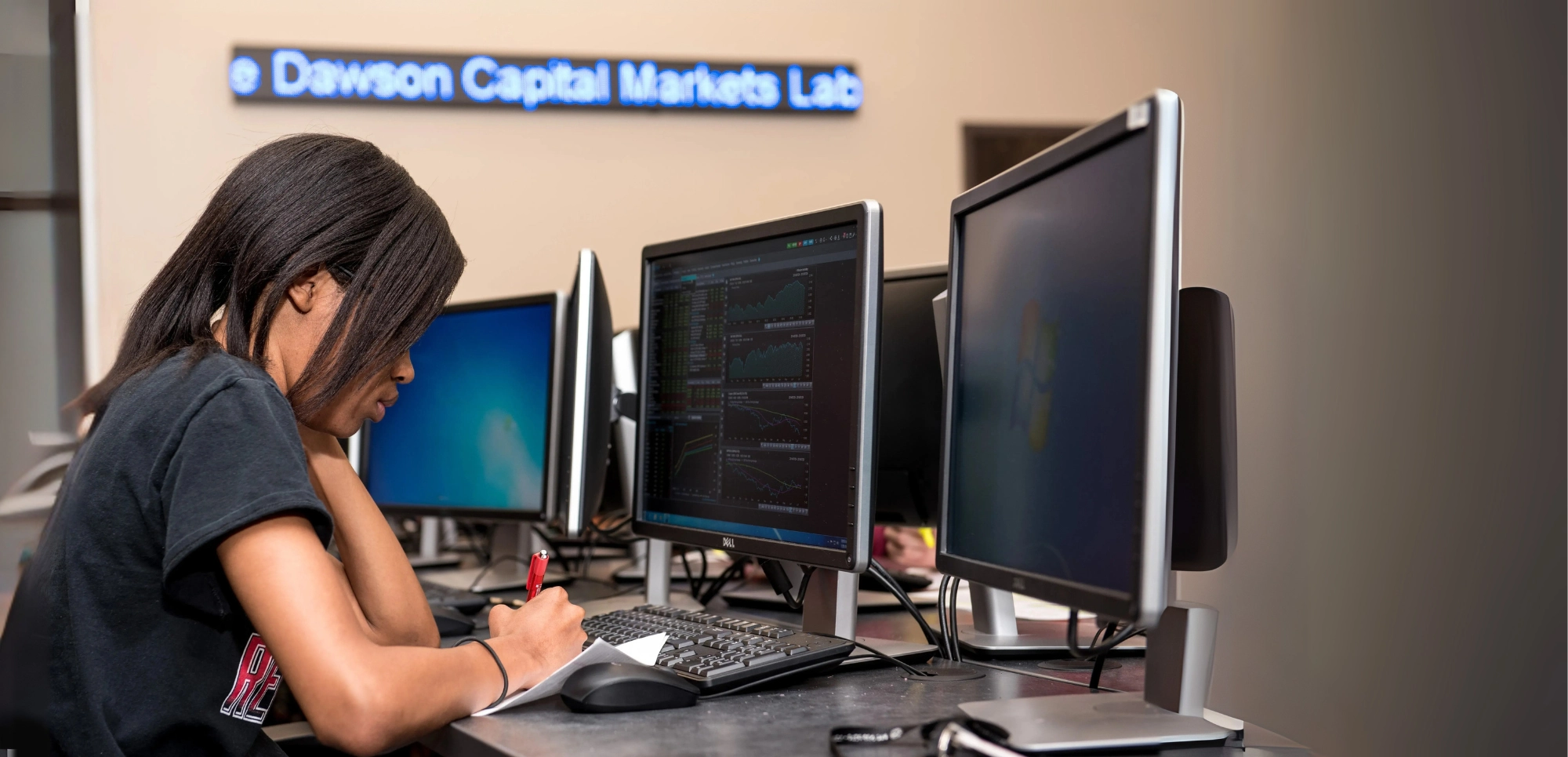 A-State business student studying business analytics in the Dawson Economics Center.