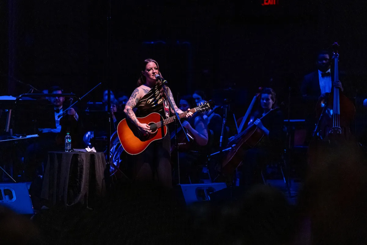 Alumnus Ashley McBryde performs with the Delta Symphony Orchestra on campus.