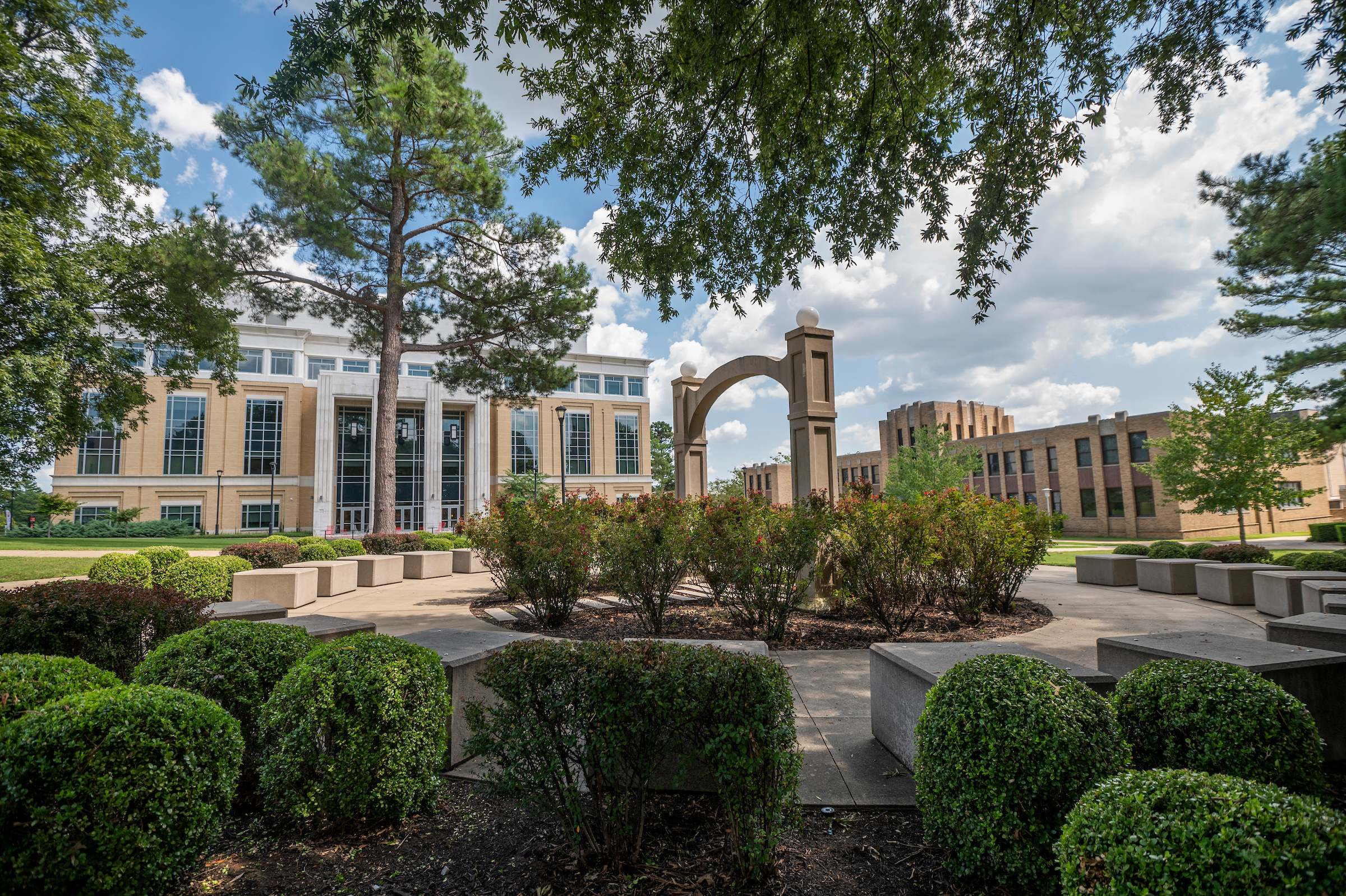 arkansas state university campus landscape photo of the original arch.