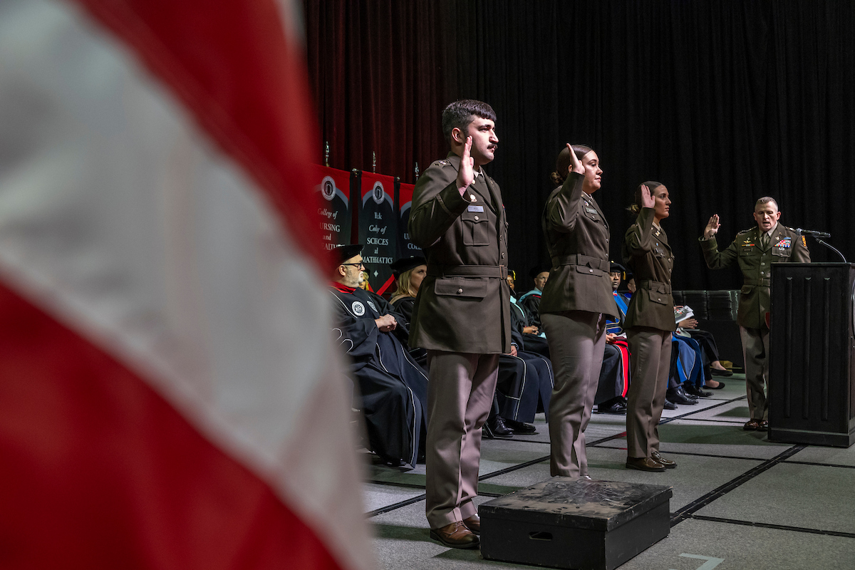 A-State ROTC cadets take oath during a commissioning ceremony at graduation.