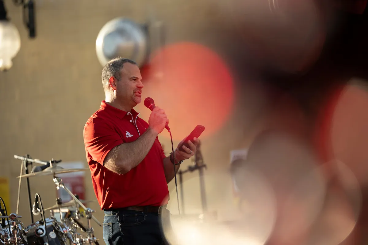 Chancellor Todd Shields addresses the crowd at the 2024 Paint the Town Red Community Pep Rally.