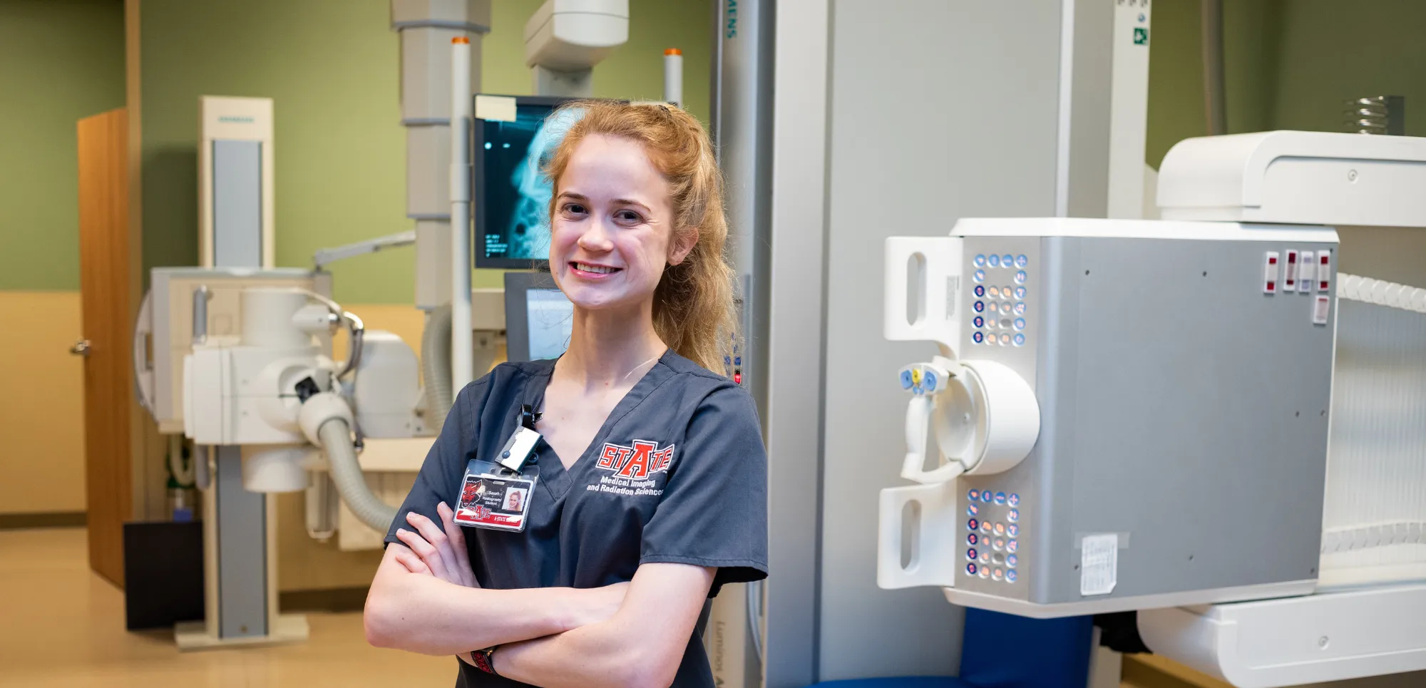A-State radiology student performing sonography on another student.