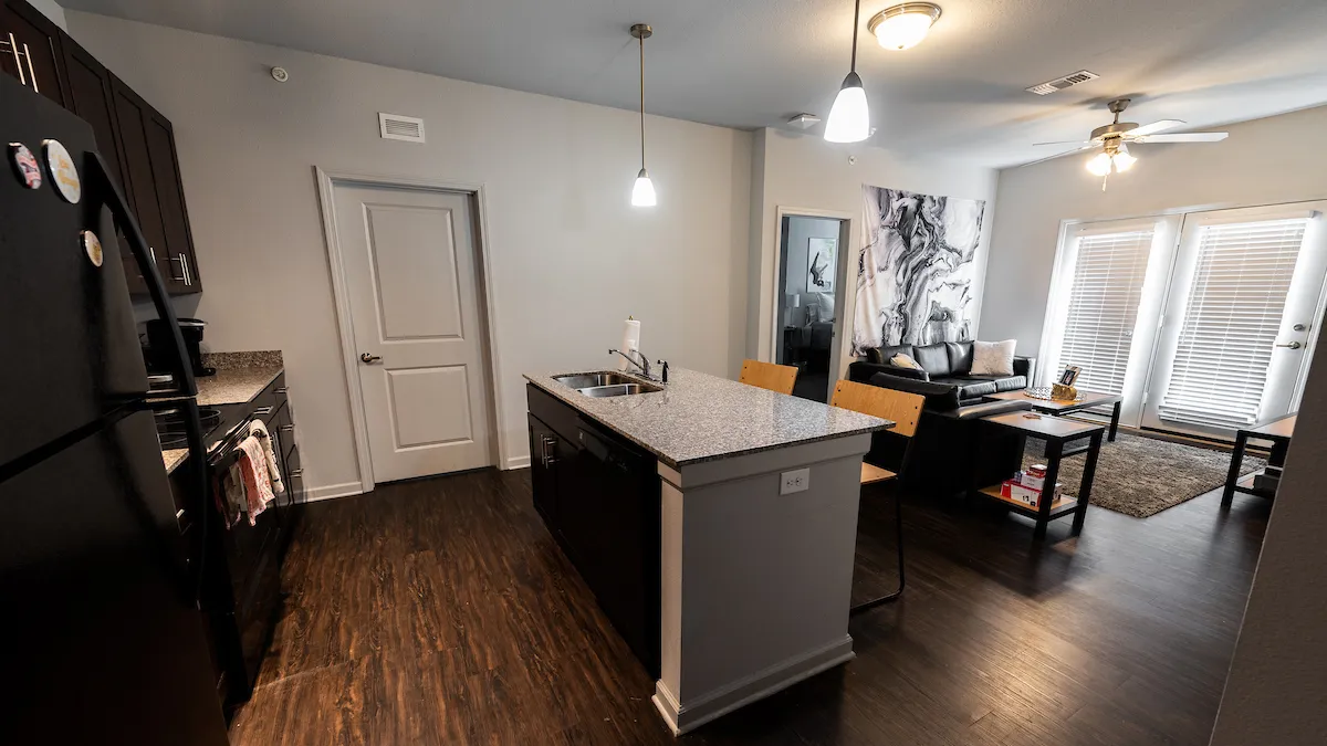 wide view of kitchen, dining, and living area