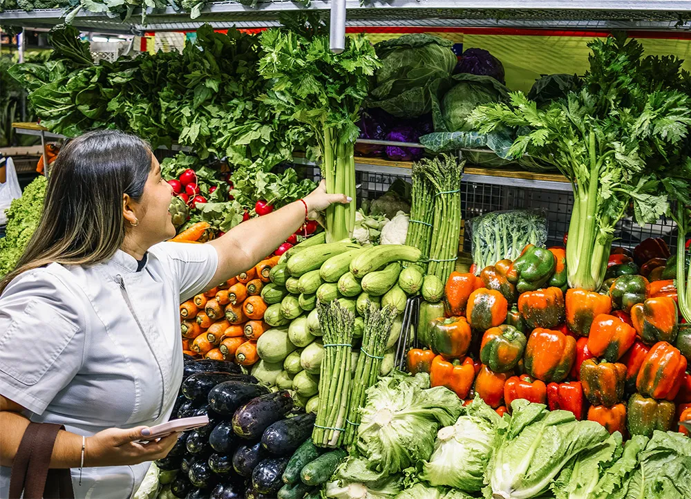 student shopping for vegetables
