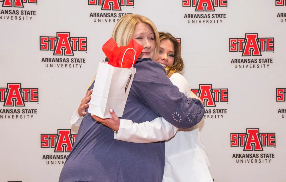 CLS Student doing samples of blood in a hands-on lab.