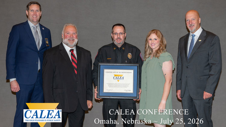 CALEA personnel with Chief Martin, Corporal Chambers and Captain Branch during the banquet. 