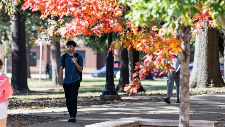 Students walk across campus at A-State.
