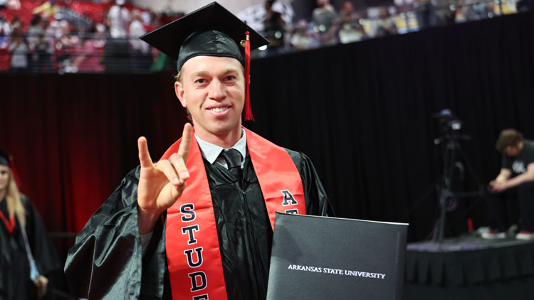 A-State graduate during the commencement exercise.  