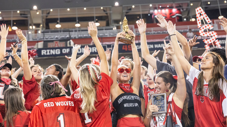 Students cheering after winning an award at Order of the Pack