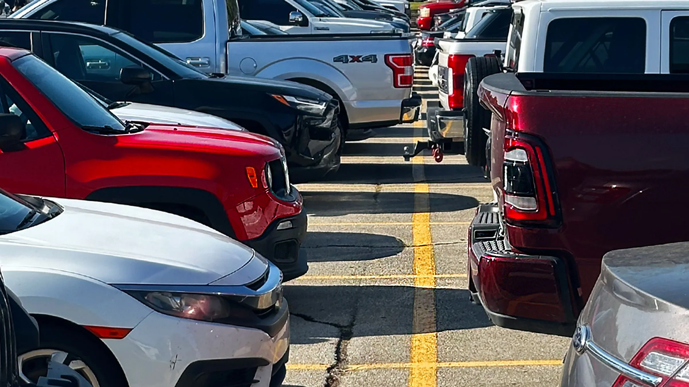 Cars parked in lot.