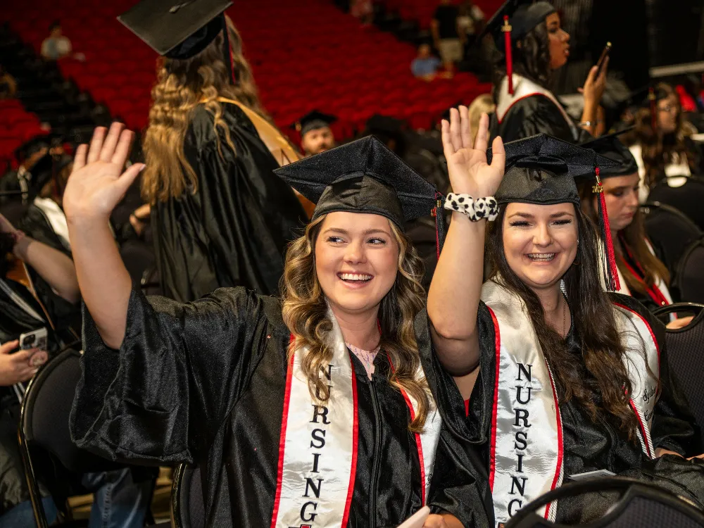 Nursing students wearing nursing sashes during the 2025 graduation ceremony