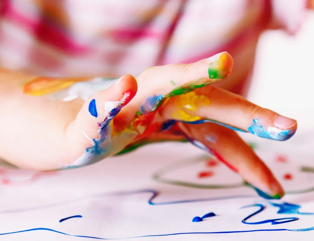 Photo of a child's hand fingerpainting