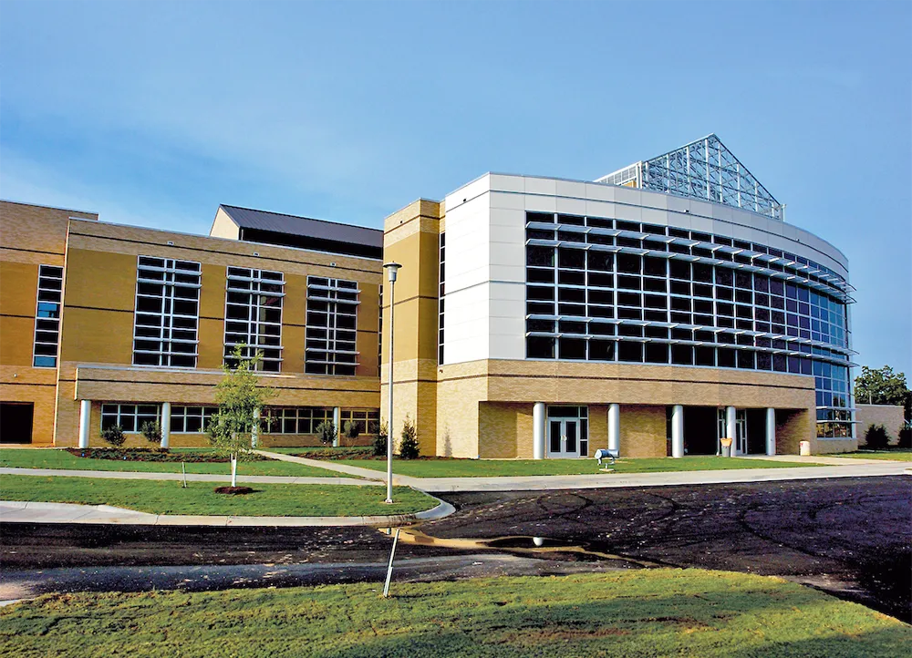 the front of the Arkansas Biosciences Institute building in the afternoon sun