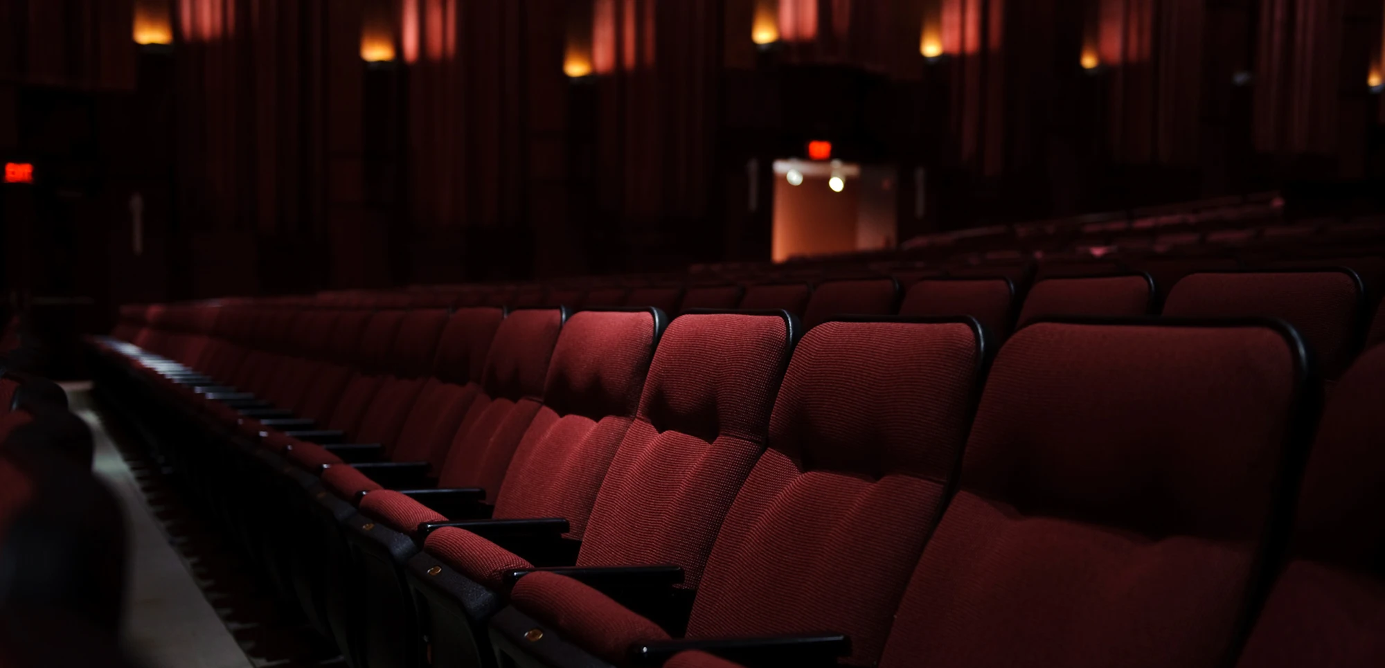 A row of red velvet seats in the Fowler Center.